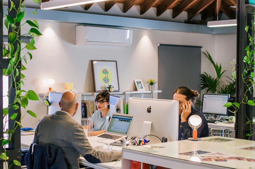 People working together at office desks